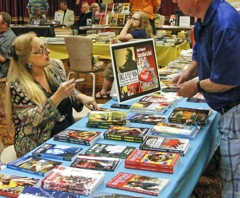 Audrey Parente (left) talks with a customer at Pulp AdventureCon 2016 in Fort Lauderdale. (Photo courtesy of Mike Hunter)