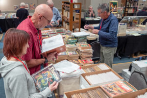 Shopping in the dealers' room at PulpFest 2025