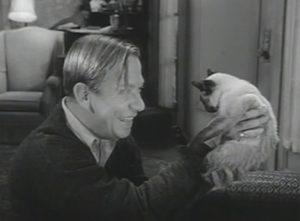 Thomas (actor Allan Melvin) and the cat.