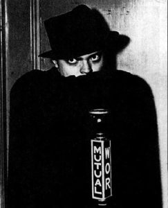 Orson Welles hiding behind the cloak.