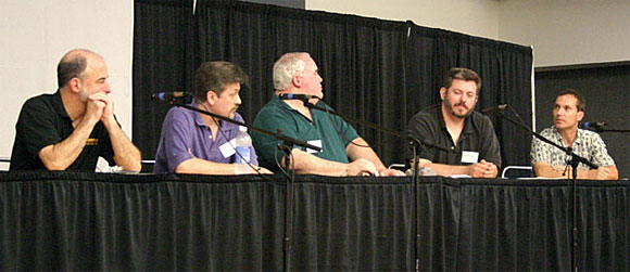 Panelists, from left, John Gunnison, Tom Roberts, Ed Hulse, Rich Harvey and Neil Mechem discuss the impact of pulp reprints on the pulp market at Pulpcon 35 on Friday evening.