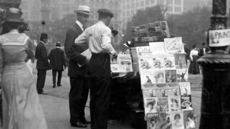 In this June 1913 photo, there's a "Popular Magazine" in the side display of this newsstand, and "Adventure" (just the nameplate visible) on the bottom row of the top display.