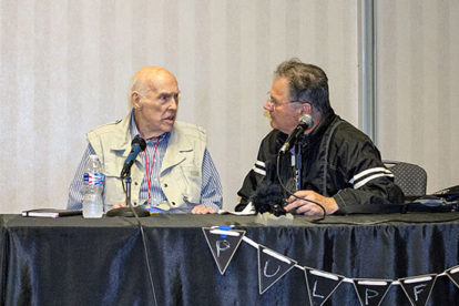 David Saunders, right, interviews pulp artist Jon Arfstrom.