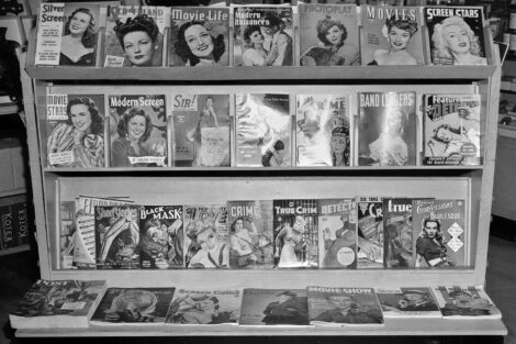 On the lower shelf of the magazine stand, a trio of Canadian-edition pulp magazines, with different covers from their U.S. counterparts, are on sale during fall 1944 in Vancouver, B.C.
