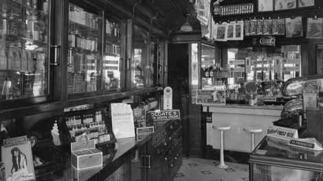 This drugstore features a hanging display (upper right) of the June 3, 1922, number of "Argosy All–Story Weekly," featuring “His Third Master” by Max Brand.