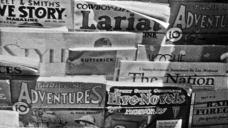 Here's a nice, tight photo of just the covers on a newsstand. You'll see May and June 1932 numbers of a few pulps. The "Time" magazine cover is dated early May 1932.