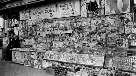 This newsstand at East 32nd Street and Third Avenue, New York City, teams with pulps from October and November 1935.