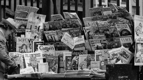 A woman makes a purchase at a New York newsstand in May 1936. Check out the pulp titles: "Short Stories" (May 10, 1936), "Spicy Detective" (June 1936), "Detective Fiction Weekly" and "Western Story Magazine."