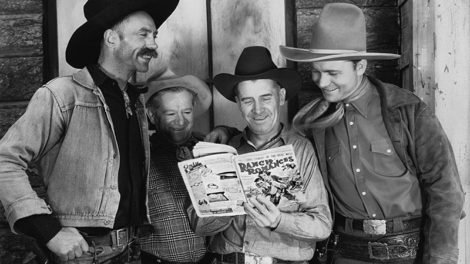 Screenwriter Robert Emmett Tansey holds a copy of the second March 1937 number of "Ranch Romances" in this photo with Hank Worden, left; an unidentified man; and Tex Ritter, right. It's a publicity photo from the 1937 Grand National Pictures' "Hittin' the Trail." (Thanks to David Lee Smith for discovering the photo, and Ed Hulse for providing the names and title of the movie.)