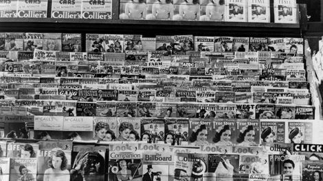 In November 1938, pulps are among the magazines for sale at this stand in Omaha, Neb.