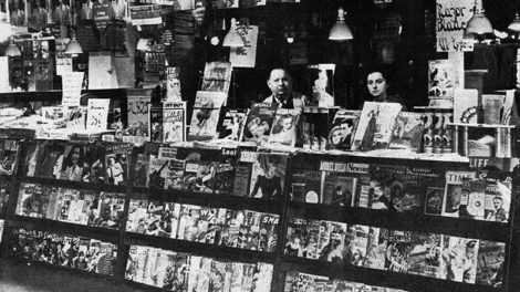 This photo was taken in late 1939 or early 1940 at the Great Lakes Newsstand at the corner of E 105th Street and Euclid Avenue, Cleveland, Ohio. There are a number of pulps dated early 1940 along the lower portion of the stand. A "Time" magazine has a cover date of Dec. 18, 1939. The quality is poor because it was published as a halftone image in the fanzine "Xenophile" in the 1970s and originally pulled from a news agent publication from 1940.