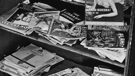 Here's a mix of pulps, comic books, "true detective" magazines and other magazines on this rolling stand. On the bottom shelf is the first issue of "Exiting Love" (Winter 1941). Moving up, you'll see "Planet Stories" (Spring 1941), "Amazing Stories" (August 1941), and a bit of "Astonishing Stories" (August 1940).