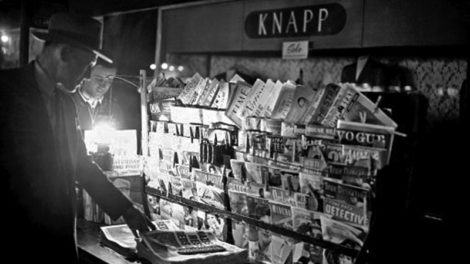 Pulps are hard to see in this photo taken during a dim-out of New York City on May 20, 1942, during World War II. There are a "Black Mask" and an "Amazing Stories" clearly visible, as well as several "true" detective magazines.