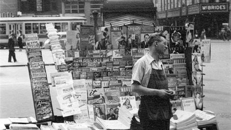 This newsstand (location unknown) displays pulps dated July 1942.
