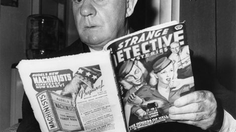Actor Henry Travers poses with the September 1942 number of "Strange Detective Mysteries" in this publicity photo for Alfred Hitchcock's "Shadow of a Doubt."