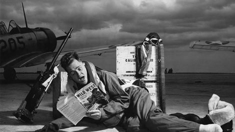 Here's a photo staged at the Harlingen Army Gunnery School, Texas, in March 1943. The caption reads: "Although the aerial gunner reputedly has one of the most exciting jobs in the Army Air Forces, it is just commonplace stuff to Staff Sgt. Millard W. Reynolds of Chattanooga, Tenn., an instructor at the Harlingen Army Gunnery School. But let him get his feet on the ground, and his hands on a magazine of Western stories, and the former bank teller really is thrilled. Look at him now!" SSgt. Reynolds is reading the Oct. 31, 1942, number of "Wild West Weekly."