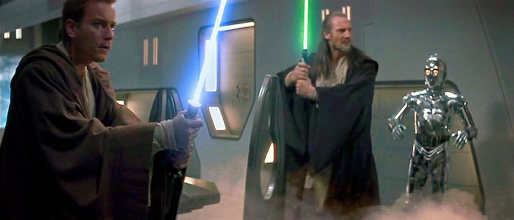 Jedis Obi-Wan Kenobi (Ewan McGregor) and Qui-Gon Jinn (Liam Neeson) stand ready for battle in "Star Wars, Episode I: The Phantom Menace."
